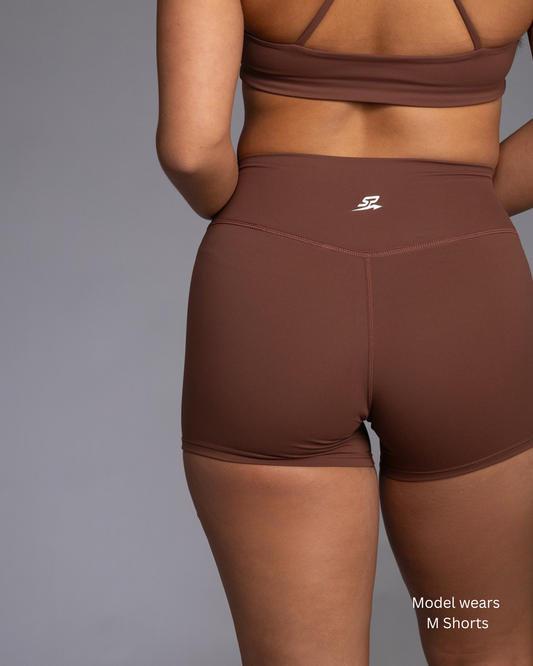 STRYD Performance Aura Flow tight training shorts in Chocolate — back view. Women's premium gym shorts Sunshine Coast QLD Australia.