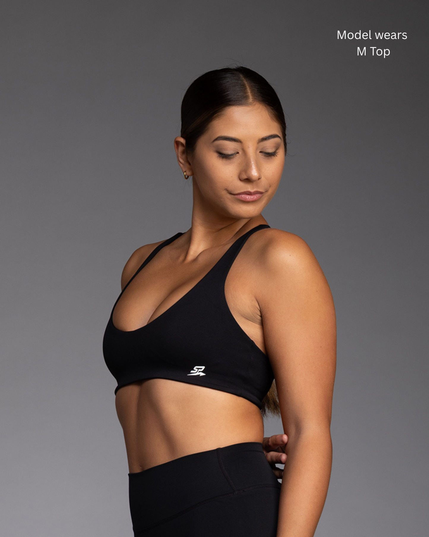 STRYD Performance Aura Flow cross back top in Black — front side view. Women's premium activewear top Sunshine Coast QLD Australia.