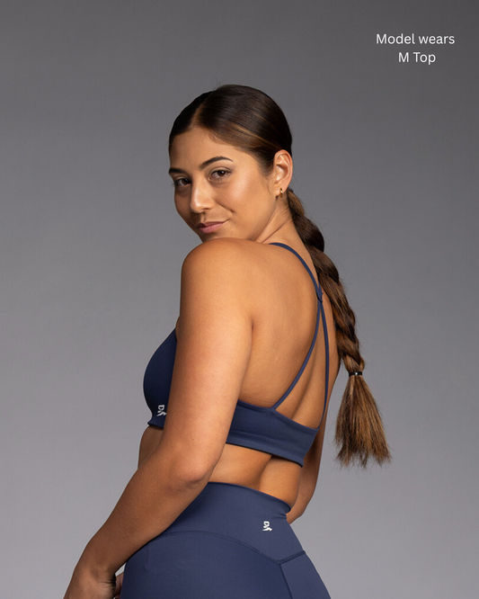 STRYD Performance Aura Flow cross back top in Deep Navy — side view. Women's premium activewear top Sunshine Coast QLD Australia.