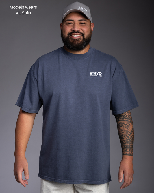 STRYD Performance I Like It Loose oversized tee in Faded Ink — front lifestyle view. Men's premium oversized activewear.