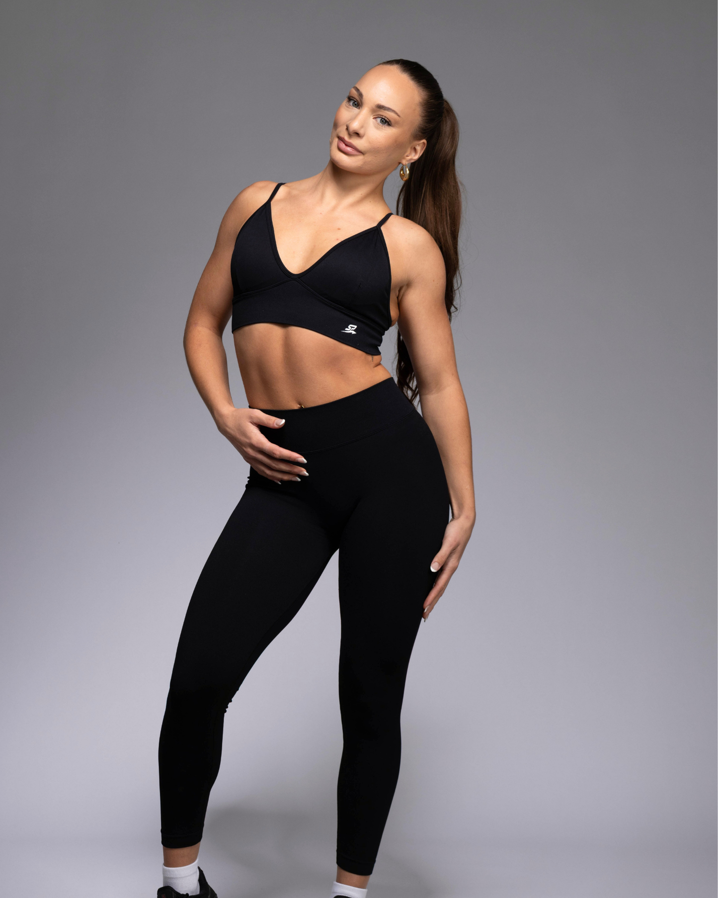 STRYD Performance Peaches scrunch leggings in Black — front view. Women's high-definition scrunch tights Australia.