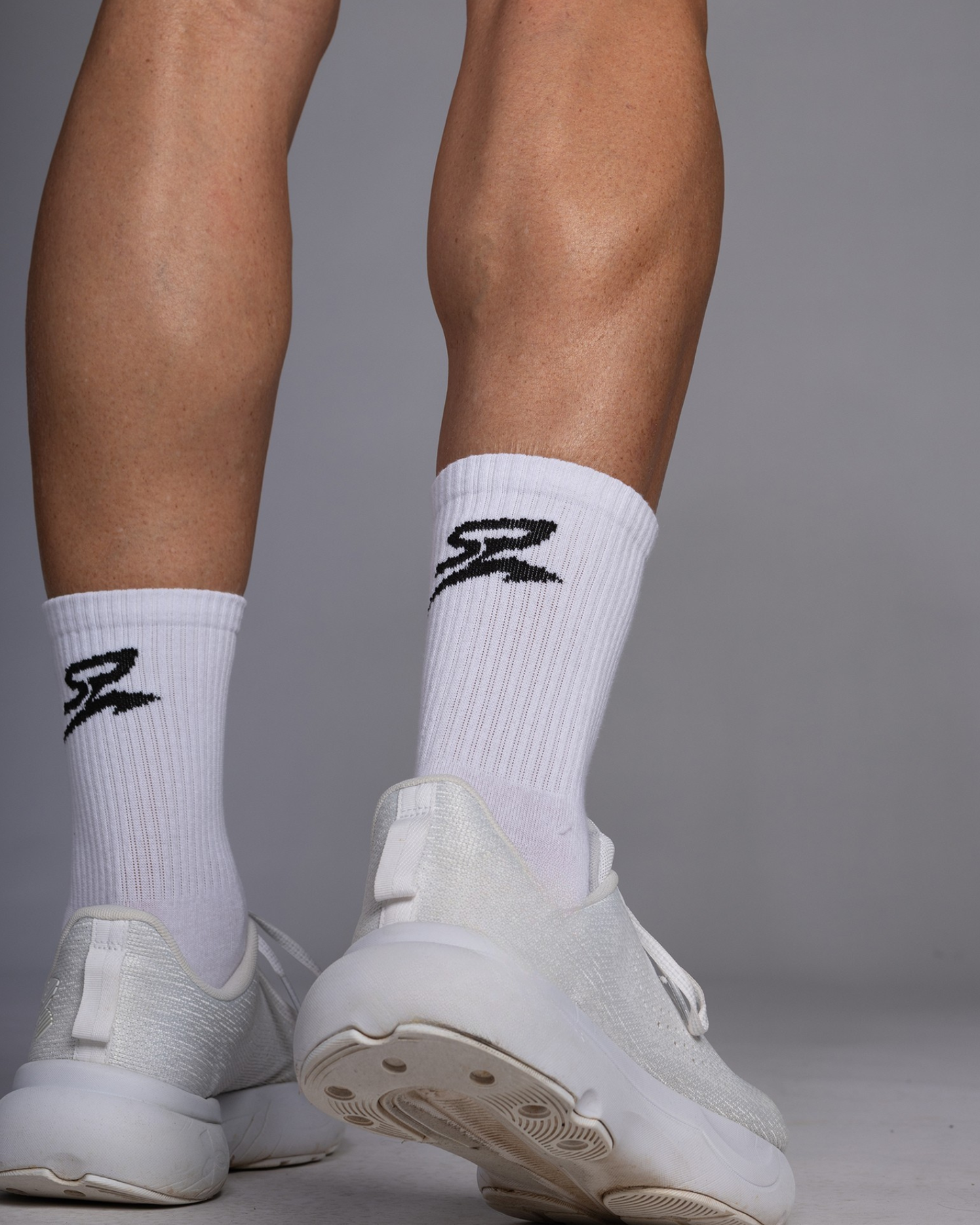 STRYD Performance crew socks in White — back view. Unisex premium performance socks Sunshine Coast QLD Australia.