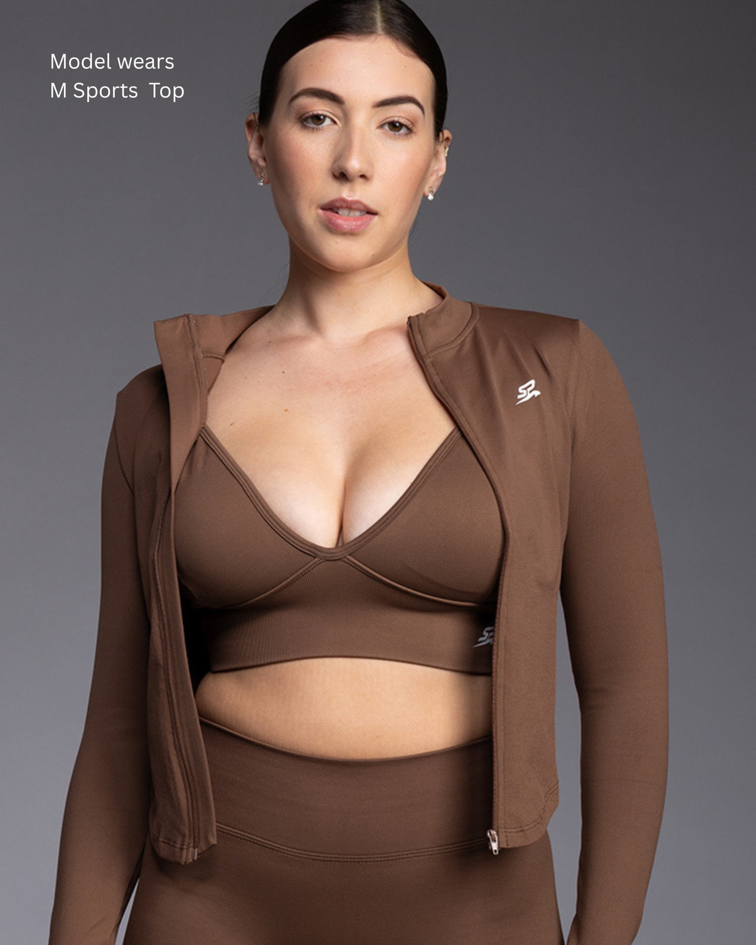 STRYD Performance womens active wear collection model wearing peaches collection