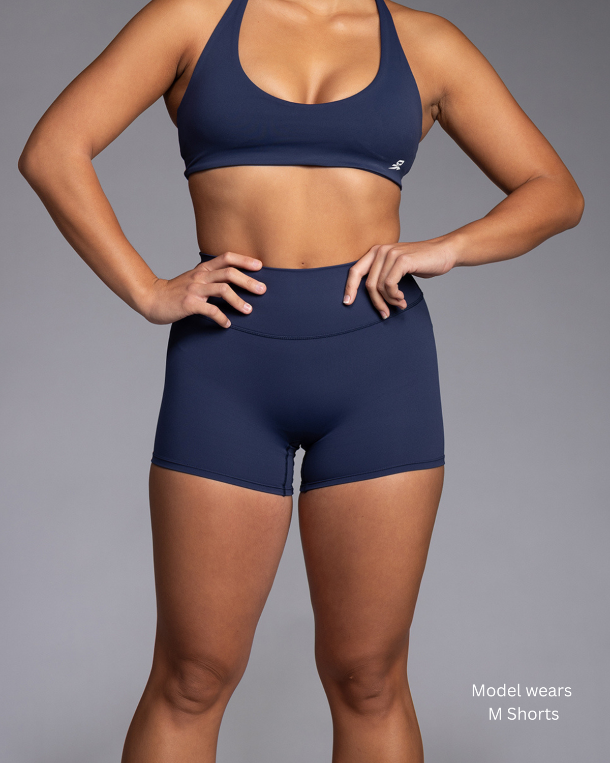 STRYD Performance Aura Flow tight training shorts in Deep Navy — front view. Women's premium activewear shorts Sunshine Coast QLD Australia.