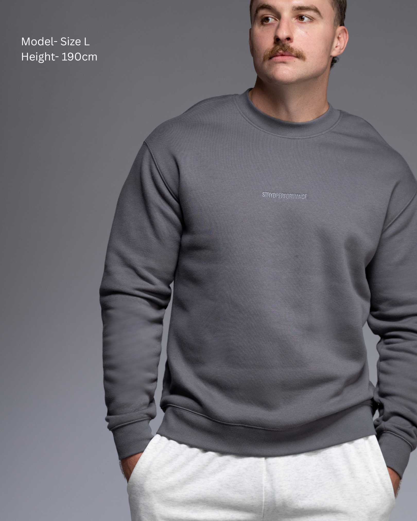 STRYD Performance Elite Unisex Crew in Slate — 320 GSM fleece, relaxed drop-shoulder fit, ribbed cuffs, premium activewear Australia, Sunshine Coast QLD Slate Colour male model Front view shop now free shipping over $150