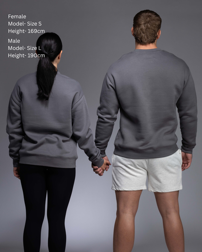 STRYD Performance Elite Unisex Crew in Slate — 320 GSM fleece, relaxed drop-shoulder fit, ribbed cuffs, premium activewear Australia, Sunshine Coast QLD Slate Colour Front view shop now free shipping over $150 male and female model side by side back view in matching elite Crew Sweaters