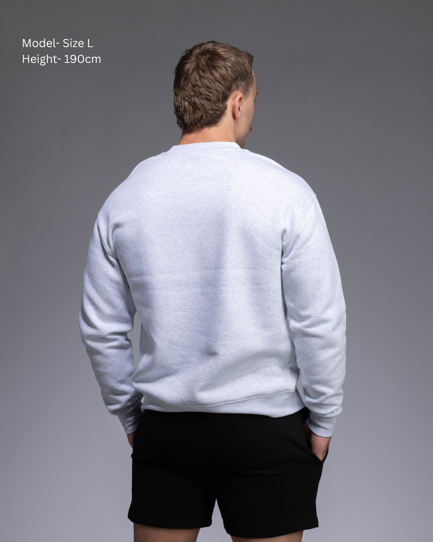 STRYD Performance Elite Unisex Crew in White Marle — 320 GSM fleece, relaxed drop-shoulder fit, ribbed cuffs, premium activewear Australia, Sunshine Coast QLD White Marle Colour back view on male model shop now free shipping over $150
