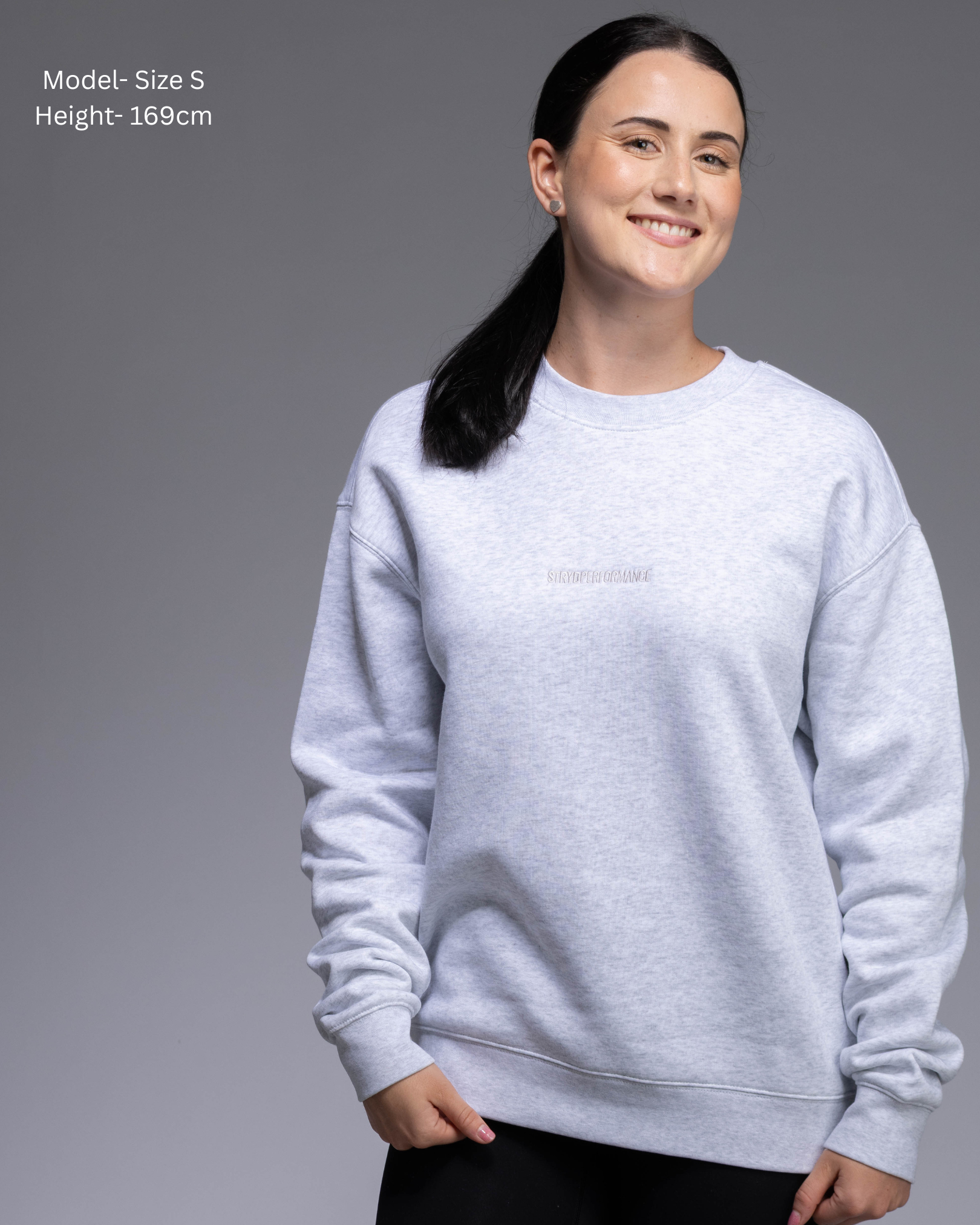 STRYD Performance Elite Unisex Crew in White Marle — 320 GSM fleece, relaxed drop-shoulder fit, ribbed cuffs, premium activewear Australia, Sunshine Coast QLD White Marle Colour Front view on female model shop now free shipping over $150
