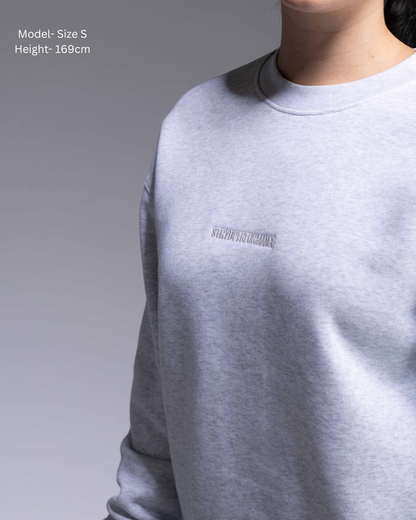 STRYD Performance Elite Unisex Crew in White Marle — 320 GSM fleece, relaxed drop-shoulder fit, ribbed cuffs, premium activewear Australia, Sunshine Coast QLD White Marle Colour Front detail view on female model shop now free shipping over $150
