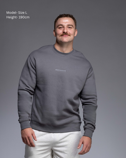 STRYD Performance Elite Unisex Crew in Slate — 320 GSM fleece, relaxed drop-shoulder fit, ribbed cuffs, premium activewear Australia, Sunshine Coast QLD Slate Colour male model Front view shop now free shipping over $150