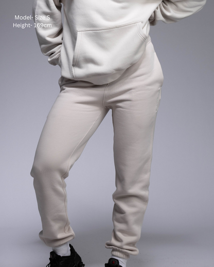STRYD Performance Elite Womens Track Pant in Bone — front view styled with matching Elite Unisex Hoodie | Premium 320GSM fleece activewear Australia, Sunshine Coast 
activewear and gym wear Queensland, fast shipping within 24hrs of order and free shipping when you spend $150 AUD, Tracksuit pants, athleisure winter sets, premium apparel 
