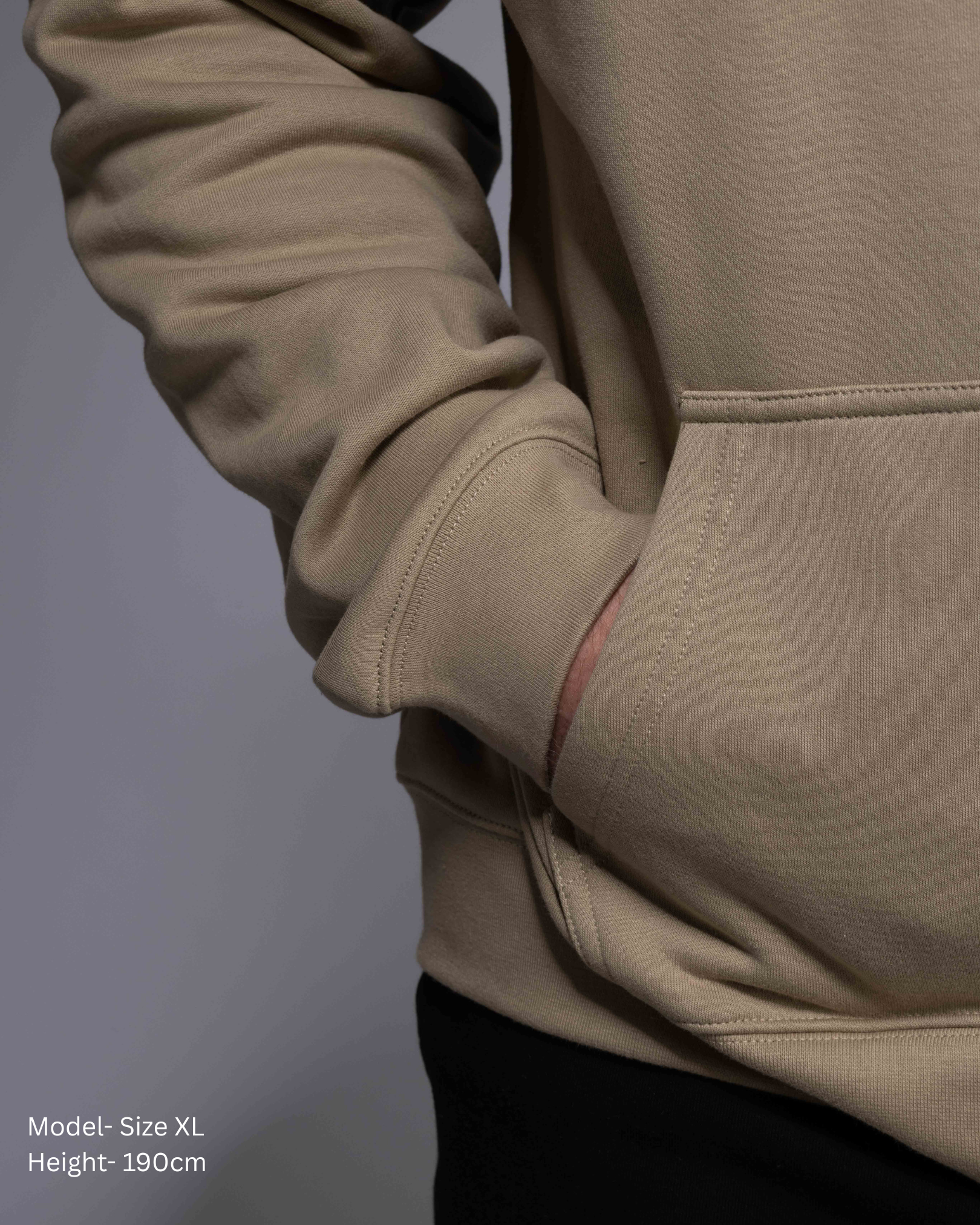 Premium Drop shoulder STRYD Performance Elite Unisex Hoodie in Sand — 320 GSM fleece, relaxed fit, drop-shoulder, ribbed cuffs, premium activewear Australia, Sunshine Coast activewear shop now free shipping over $150 Detail View of Elite Hood male Model