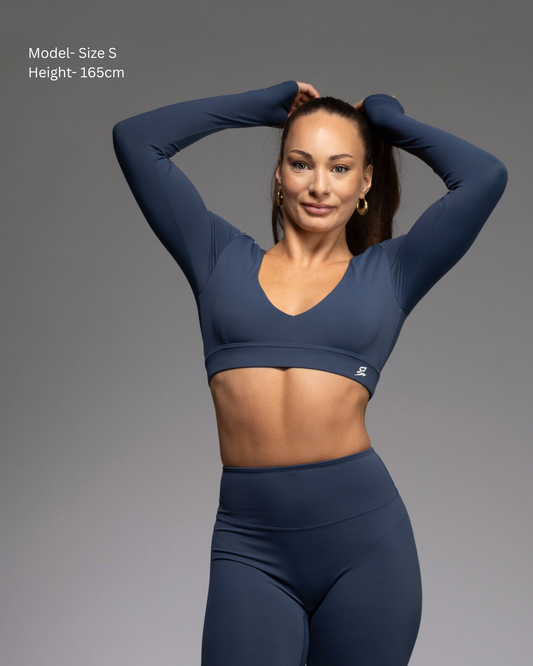 Haven Long Sleeve Crop Top in Teal – deep-V neckline with built-in padded support | STRYD Performance
