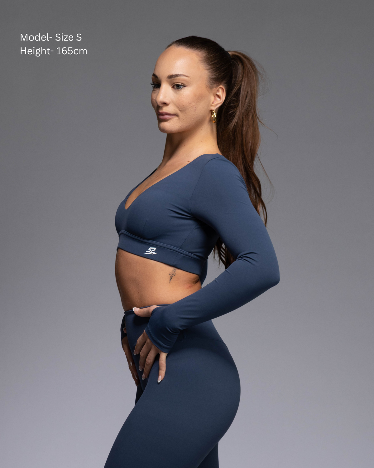 Haven Collection women's activewear set in teal – side view, premium athletic crop top with integrated support | STRYD Performance
