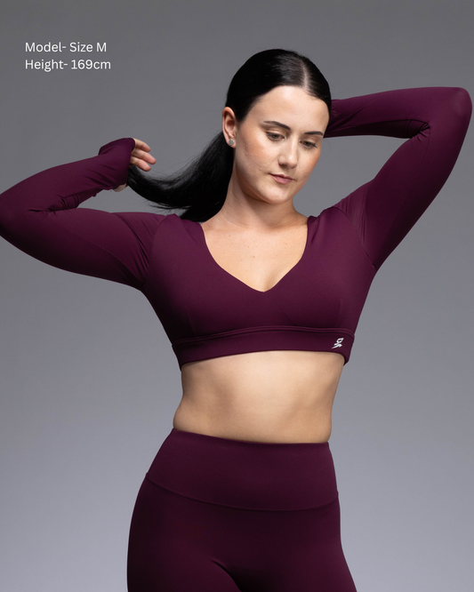 Haven Long Sleeve Crop Top in Berry – sculpting compression training top with thumbhole sleeves | STRYD Performance

