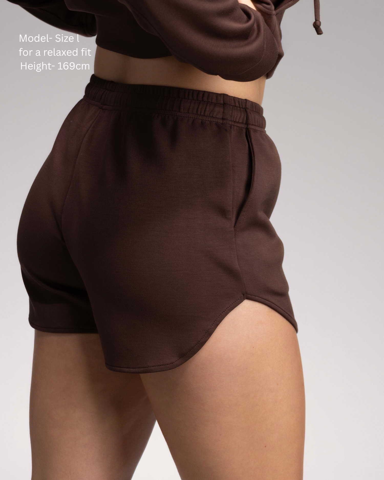 STRYD Performance Soul Soft curved hem shorts — Side/ Back view. Women's premium soft activewear and lounge wear shorts Australia. Espresso Colourway