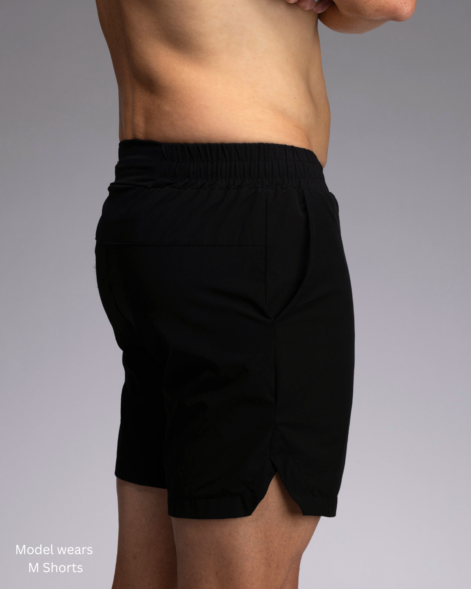 STRYD Performance Apex 5" training shorts in Black — side view. Men's premium gym shorts Sunshine Coast Australia.