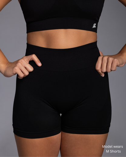 STRYD Performance Vibe training tight shorts in black — front view. Women's training shorts Australia.