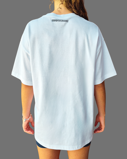 STRYD Performance I Like It Loose Block oversized unisex WHITE tee – Back view relaxed fit gym and street style t-shirt female fitness model in Studio photo. shop sunshine coast performance activewear and gym fitness apparel