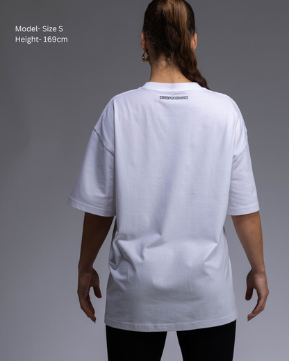 STRYD Performance I Like It Loose Block oversized unisex WHITE tee – Back view relaxed fit gym and street style t-shirt female fitness model in Studio photo. shop sunshine coast performance activewear and gym fitness apparel
