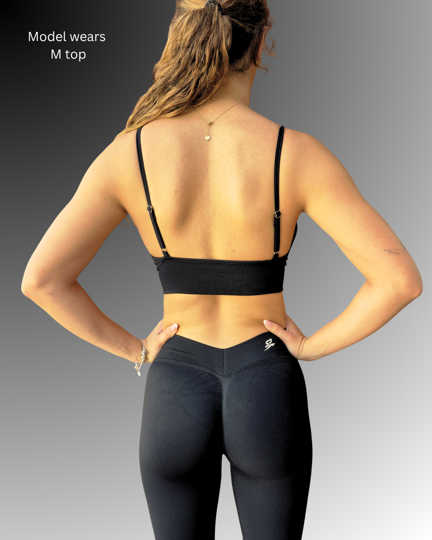 STRYD Performance Peaches scrunch leggings and Peaches push up sports top in Black — lifestyle view. Women's premium sculpting activewear Australia.