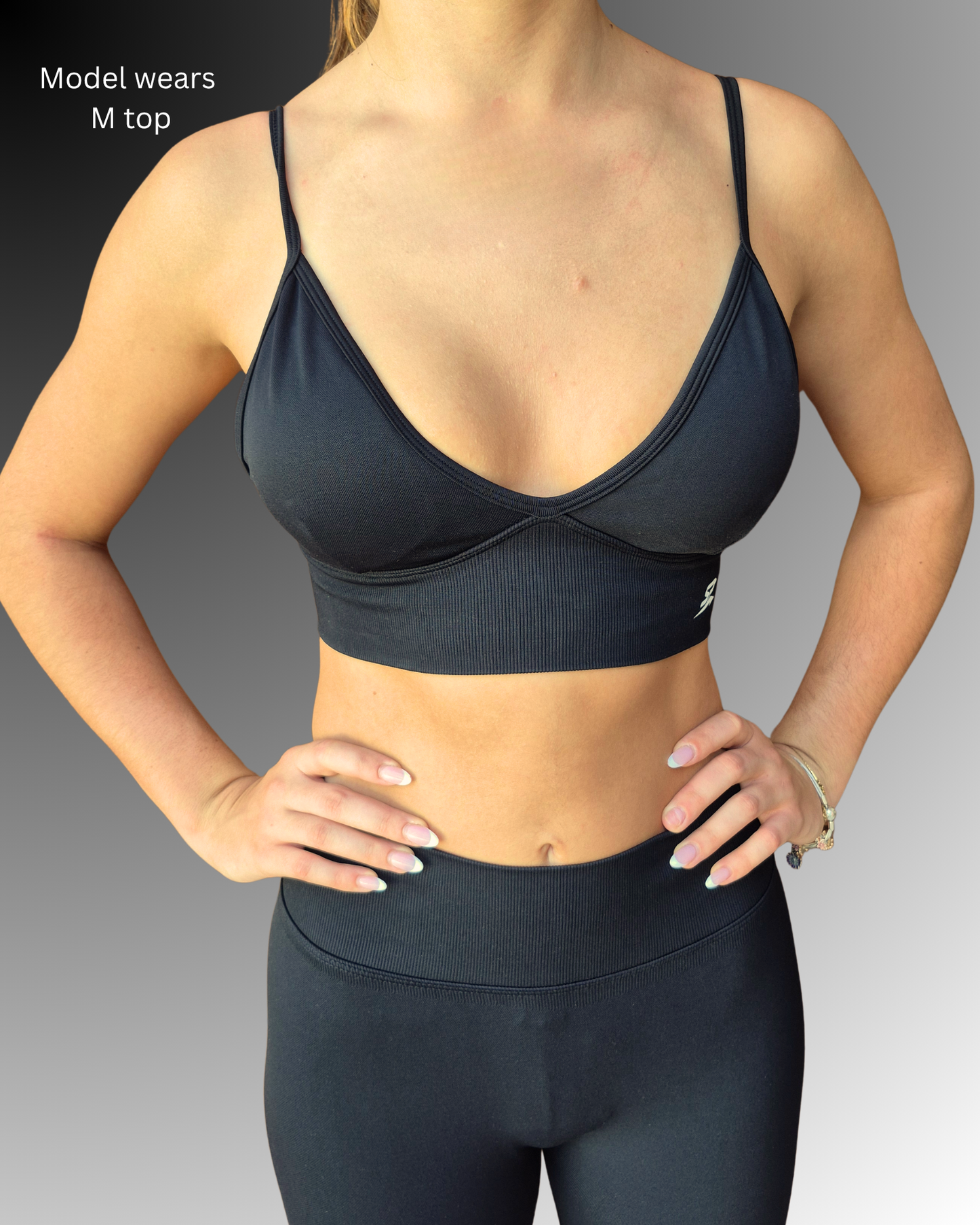 STRYD Performance Peaches push up sports top in black and leggings— front detail view. Women's premium gym top Australia.