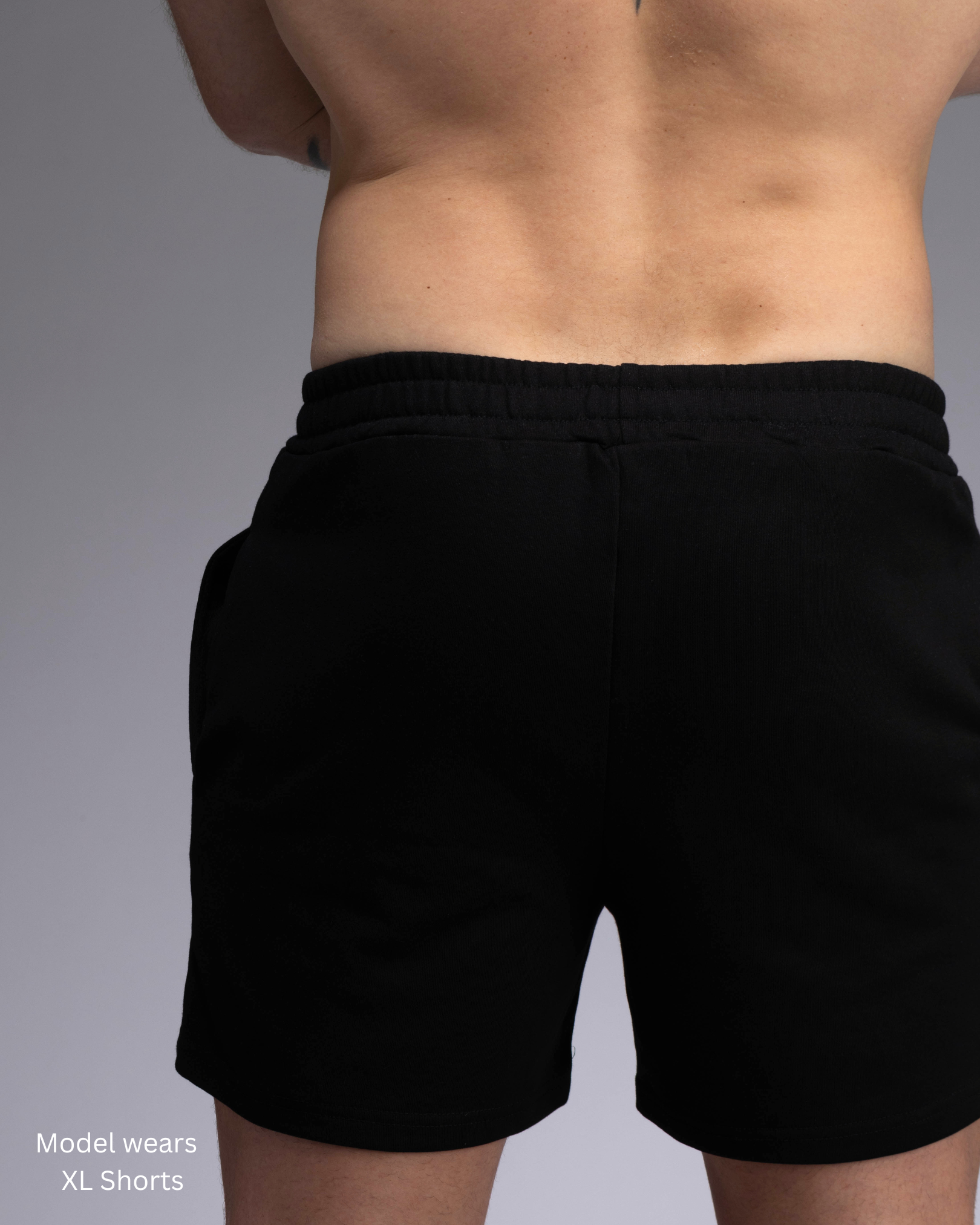 STRYD Performance Roam 5" track shorts in Black —back view. Unisex relaxed fit training shorts Sunshine Coast QLD Australia.