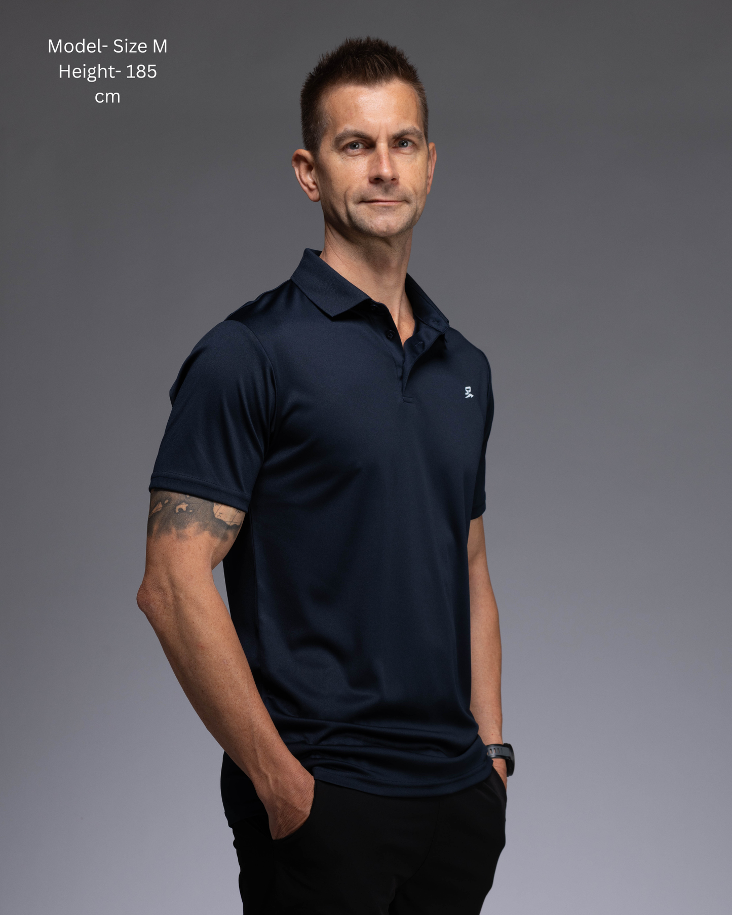 STRYD Performance Tee Off Performance Polo in Navy —Side view, STRYD Performance logo. Men's premium active tennis polo Australia.

