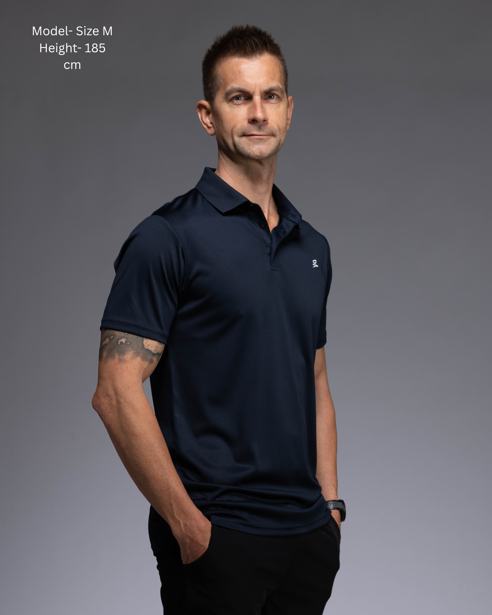 STRYD Performance Tee Off Performance Polo in Navy —Side view, STRYD Performance logo. Men's premium active tennis polo Australia.
