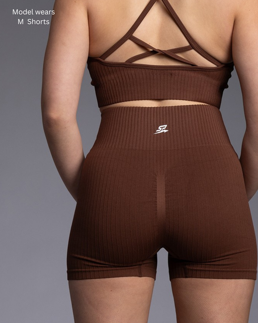 STRYD Performance Glow tight training shorts in Chestnut — back view. Women's premium gym shorts Australia.
