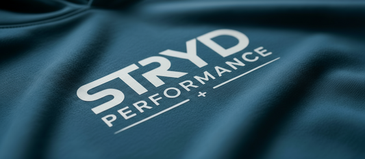 Clean STRYD Performance logo on petrol blue hoodie