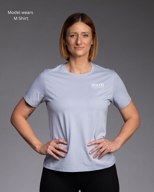 STRYD Performance Muse Tee in Powder Blue — front view. Women's premium regular fit activewear tee. I came here for the alone time print.