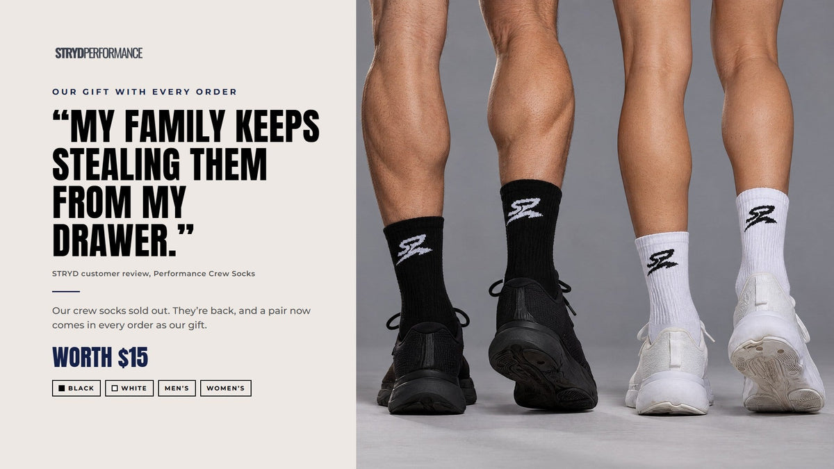 Performance Crew Socks in black and white on two runners. Our gift with every order, worth $15.