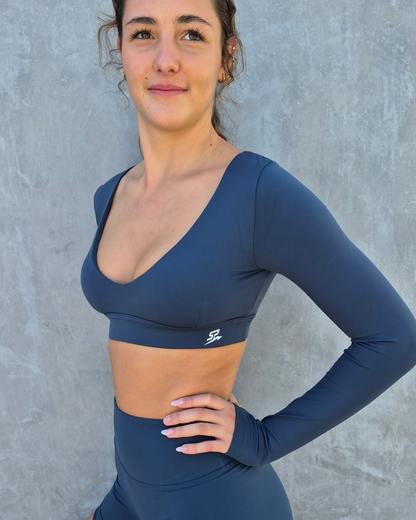 Haven women's crop top – side profile showing elongated sleeves and compression silhouette | STRYD Performance
